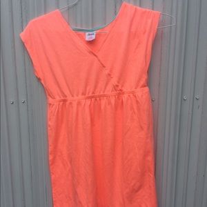 A vibrant girls bathing suit cover up